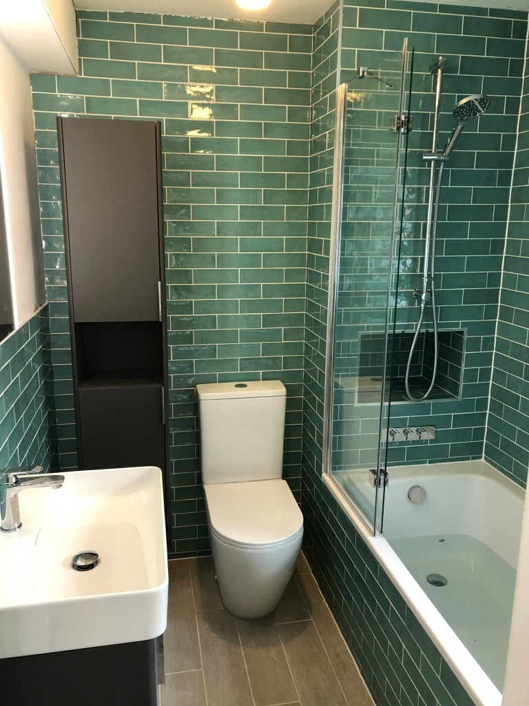 Tiled bathroom with modern fixtures